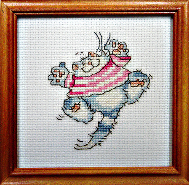 Framed Cross Stitch Embroidery picture of a cat in a red dress