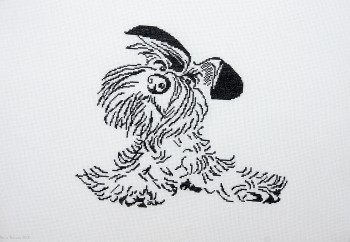 Cross Stitch Embroidery picture of a black doggy for framing